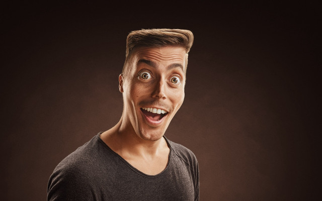 Man surprised funny face black free wallpaper for desktop - medium preview image