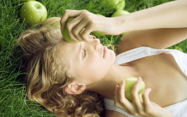 Woman lying grass apples night free wallpaper for desktop - medium preview image