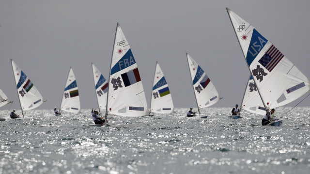 Sailboats ocean sunny grey sky free wallpaper for desktop - medium preview image