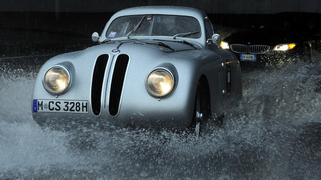 Car flooded street rain headlights free wallpaper for desktop - medium preview image