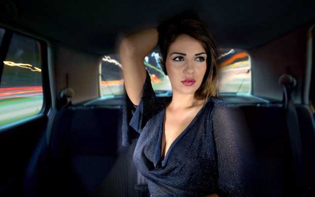 Woman car blurry background fashion free wallpaper for desktop - medium preview image