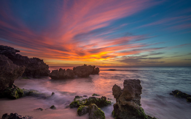 Sunset ocean rocks water clouds free wallpaper for desktop - medium preview image