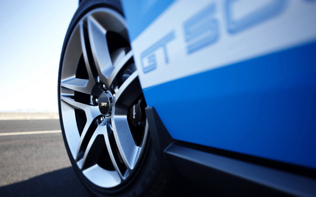 Car tire closeup road sky free wallpaper for desktop - medium preview image