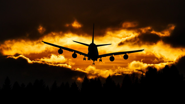 Sunset plane clouds autumn fire free wallpaper for desktop - medium preview image