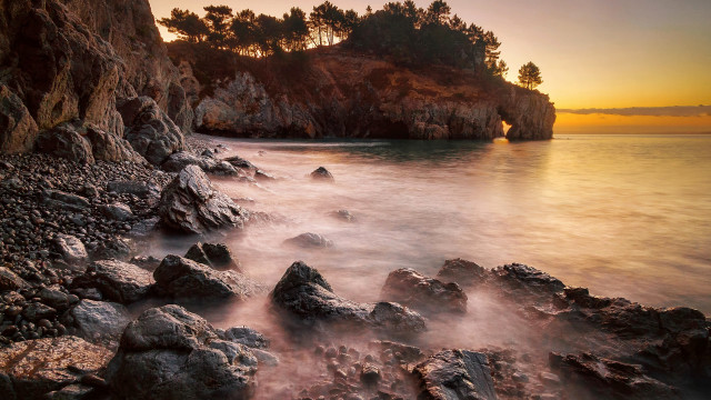 Rocky beach small island sunset free wallpaper for desktop - medium preview image