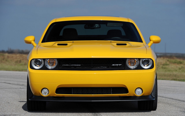 Yellow car parked paved road free wallpaper for desktop - medium preview image