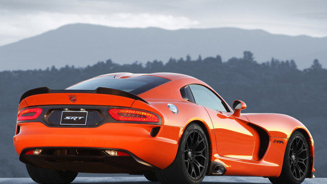 Bright orange cobra sports car free wallpaper for desktop - medium preview image