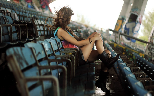 Woman stadium bench crossedlegs fashion free wallpaper for desktop - medium preview image