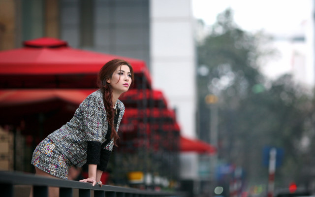 Woman rail building red umbrellas free wallpaper for desktop - medium preview image