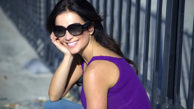 Woman sunglasses fence purple shirt free wallpaper for desktop - medium preview image