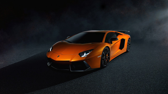 Orange sports car night fog free wallpaper for desktop - medium preview image