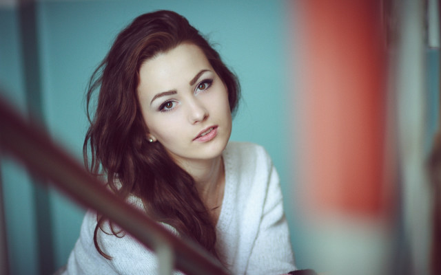 Woman serious longhair browneyes jewelry free wallpaper for desktop - medium preview image