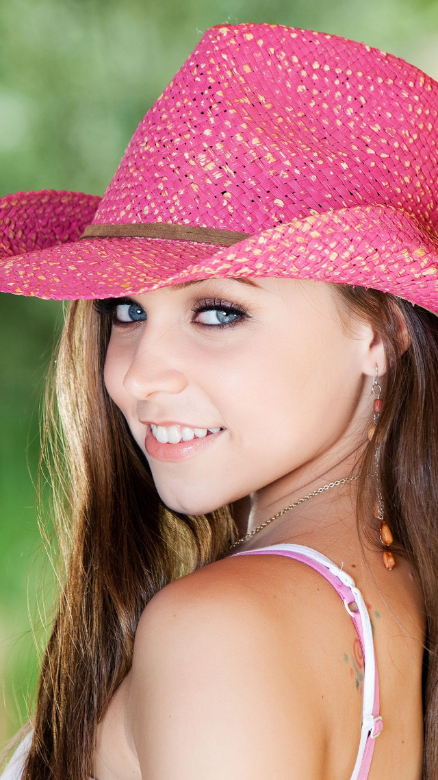Girl pink hat smiling green free wallpaper for mobile - medium preview image