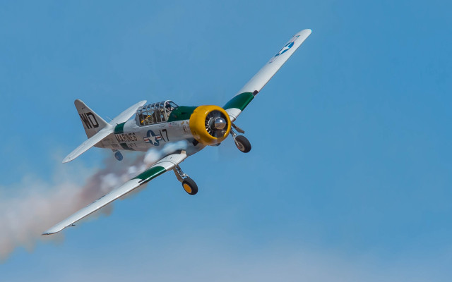 Small airplane blue sky smoke free wallpaper for desktop - medium preview image