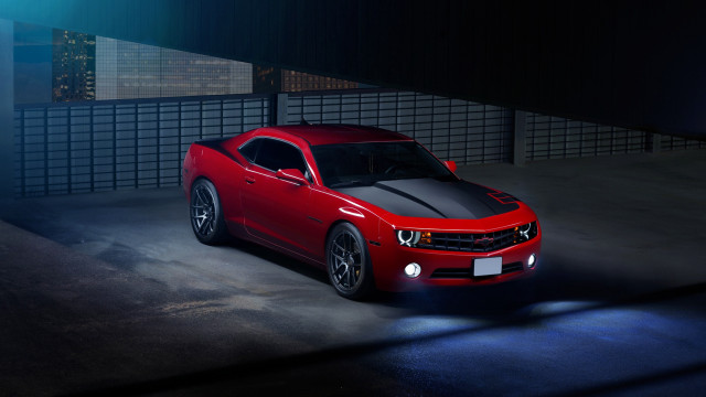 Red sports car garage night free wallpaper for desktop - medium preview image