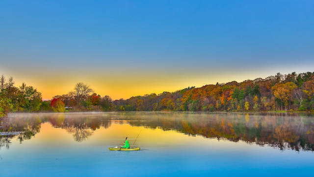 Man boat lake trees sky free wallpaper for desktop - medium preview image