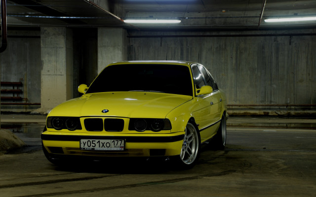 Yellow car parking garage wood free wallpaper for desktop - medium preview image
