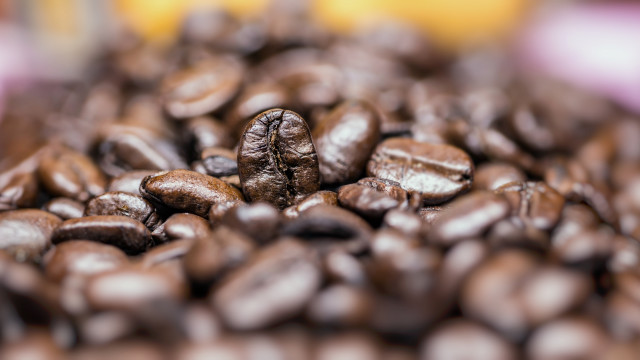 Coffee beans hyperrealism blurry background free wallpaper for desktop - medium preview image