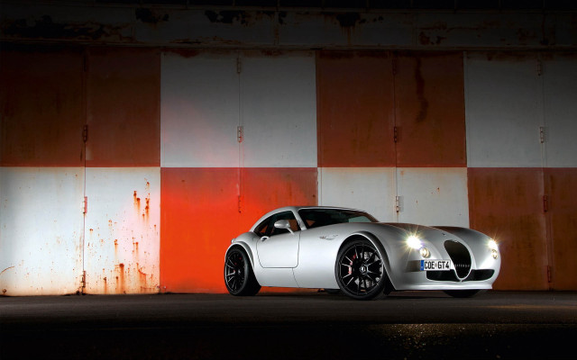 Silver sports car orange white free wallpaper for desktop - medium preview image
