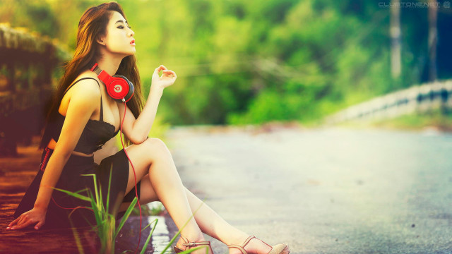 Woman sitting headphones cigarette green free wallpaper for desktop - medium preview image