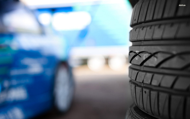 Tire closeup shallowbokeh blue sky free wallpaper for desktop - medium preview image