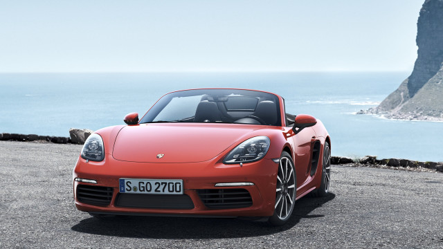 Red sports car ocean cliff #2 free wallpaper for desktop - medium preview image