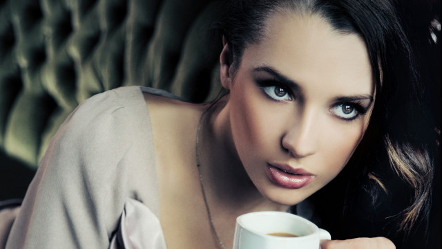 Woman coffee mug serious photorealistic free wallpaper for desktop - medium preview image