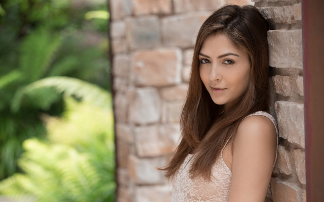 Woman brick wall smile cosplay free wallpaper for desktop - medium preview image