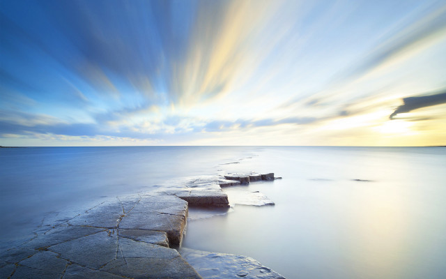 Sunset water rocks blue sky free wallpaper for desktop - medium preview image