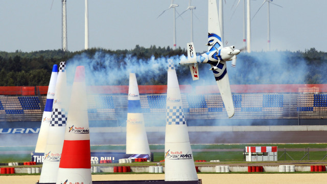 Futuristic plane over cones cityscape free wallpaper for desktop - medium preview image