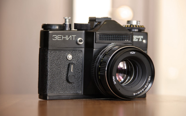 Camera on table lens attached free wallpaper for desktop - medium preview image