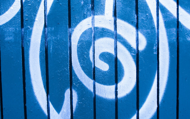 Blue wall white swirls fire free wallpaper for desktop - medium preview image