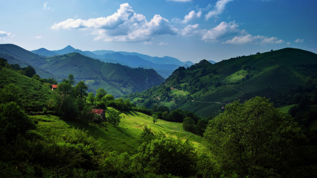 Lush green hillside house mountains #2 free wallpaper for desktop - medium preview image