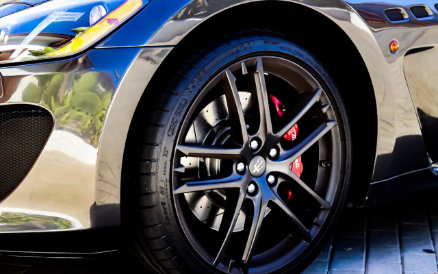 Car tire street sky building free wallpaper for desktop - medium preview image