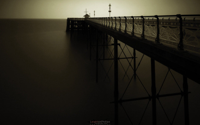 Foggy pier lighthouse horizon sunset free wallpaper for desktop - medium preview image