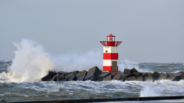 Lighthouse waves stormy beach cloud free wallpaper for desktop - medium preview image