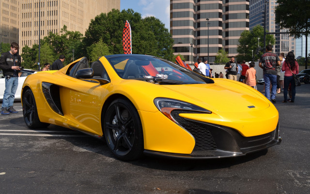 Yellow sports car city people free wallpaper for desktop - medium preview image