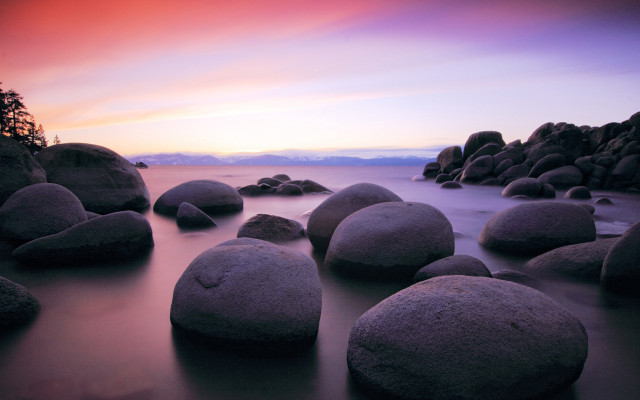 Beach rocks ocean sunset cloudy free wallpaper for desktop - medium preview image