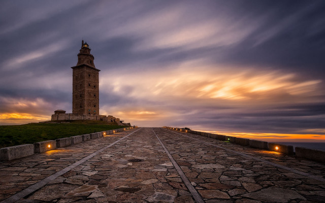Stone tower walkway dusk cityscape free wallpaper for desktop - medium preview image