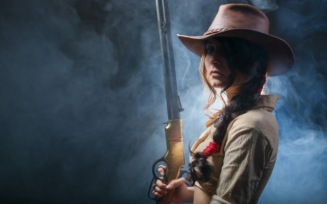 Woman cowboyhat gun smoking portrait free wallpaper for desktop - medium preview image