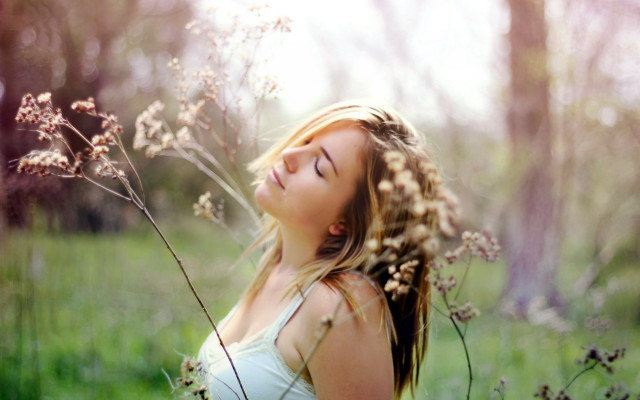 Woman standing field flowers closed free wallpaper for desktop - medium preview image