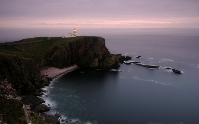 Lighthouse cliff ocean dusk pink free wallpaper for desktop - medium preview image