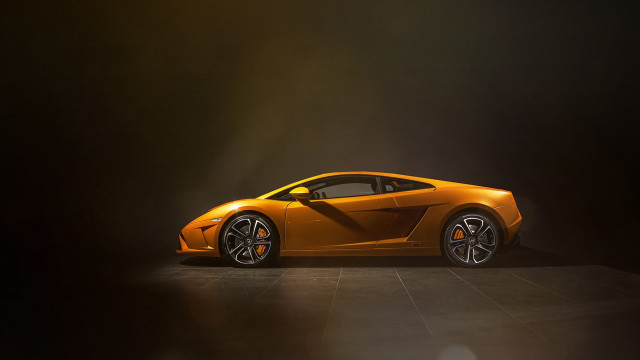 Orange sports car dark room #18 free wallpaper for desktop - medium preview image
