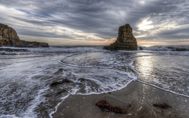 Beach waves rocks cloudy sky free wallpaper for desktop - medium preview image