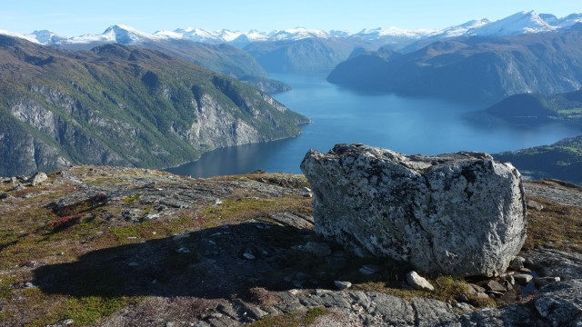 Large rock lake mountains snowy free wallpaper for desktop - medium preview image