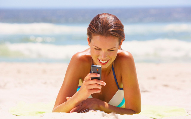 Beach woman smiling phone bikini free wallpaper for desktop - medium preview image