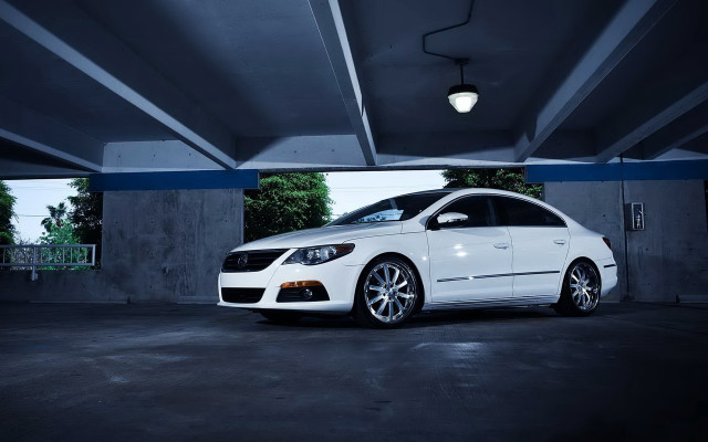 White car parking garage rim free wallpaper for desktop - medium preview image