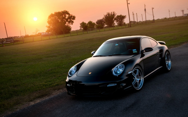 Black sports car sunset field free wallpaper for desktop - medium preview image