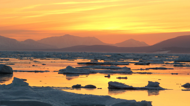 Sunset icebergs mountains water orange free wallpaper for desktop - medium preview image