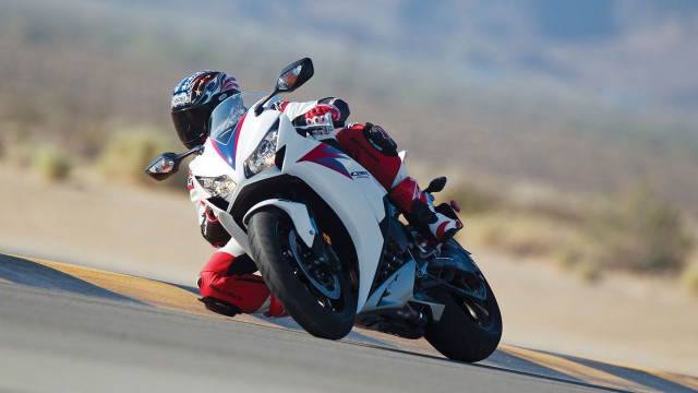 Motorcycle rider mountain road helmet free wallpaper for desktop - medium preview image